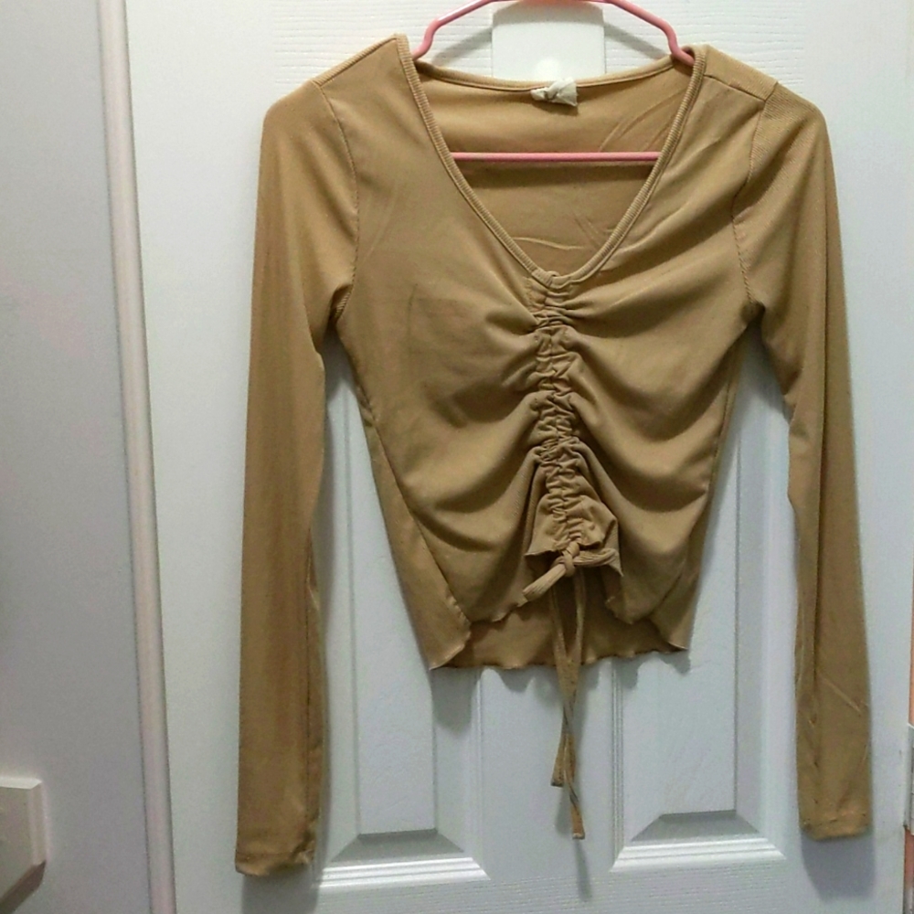 Women's light brown long sleeve draw string top